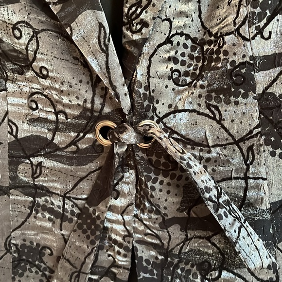 Beautiful silver and black jacket that has a tie at the waist. - Picture 3 of 3